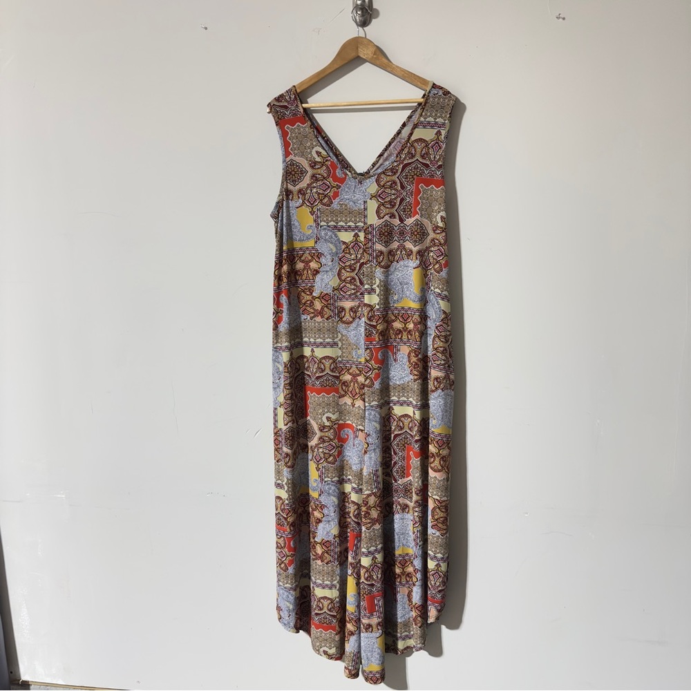 👉Sami & Jo Plus jumpsuit featuring a bold patchwork paisley and geometric print.